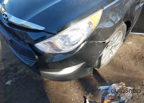 2013 Hyundai Sonata Hybrid Limited z USA, uszkodzony, nr VIN KMHEC4A42DA092228